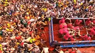 Tomatina battle paints the Spanish town of Bunol in red