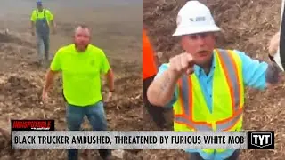 Armed White Mob Ambushes Black Trucker, Hurts Dog Before Tipping Truck With Bulldozers