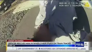 WATCH: Police officer saves man in wheelchair from oncoming train