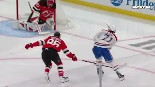 Jake Evans scores a goal against the New Jersey Devils