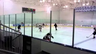 Hockey - Joseph runs a passing and shooting drill