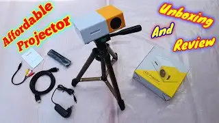 MINI PROJECTOR UNBOXING AND REVIEW || UNBOXING AND REVIEW || UNBOX GIRI