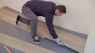 How to install Luxury Vinyl Tiles when the wall is not straight? Tarkett LVT