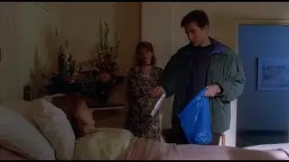 Mulder visits Scully in the hospital after she wakes up. [X-Files &mdash; One Breath 2x08]