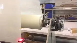 Edge guided center unwinder
