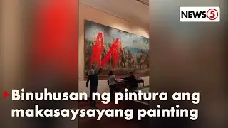 Climate activists vandalise Columbus painting on Spain's National Day