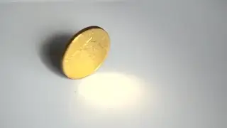 Gold Coin Spinning Stock Video