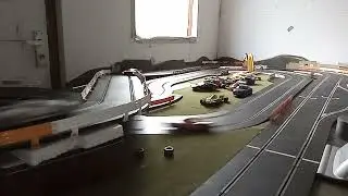 Scalextric endurance race against 3 pace cars using Rcs64.