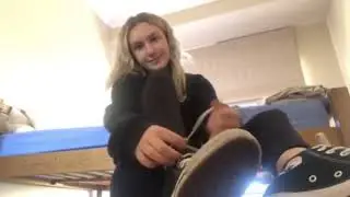 Aussie teen girl takes off socks and shoes to show her big barefeet