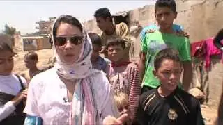 UNICEF USA: Lucy Liu Visits Syrian Child Refugees