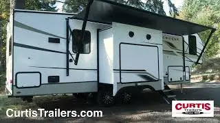 Find out why we love the Cougar Half-Ton 29RKS by Keystone RV at Curtis Trailers!