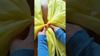 Easy DIY party decor! Use Dollar tree tablecloths to make fun giant bows! #craft #party