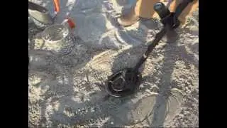 Garrett Ace 250 metal detecting beach setup on dry sand