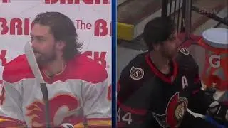 Erik Gudbranson goes after Rasmus Anderson after he hitTim Stutzle Calgary Flames at Ottawa Senators