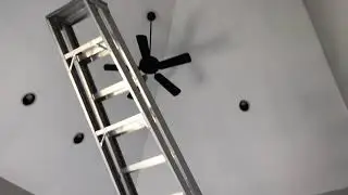20 foot ladder in living room replacing ceiling fan