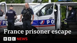 Manhunt under way in France after two prison officers killed in prisoner escape | BBC News