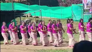 Galo women wearing traditional dress and perfoming dance 