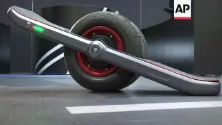 Electric self-balancing, one-wheeled skateboard