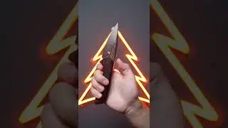 Vanguard StarRunner DLC knife with M390 steel and DLC Titanium handle.
