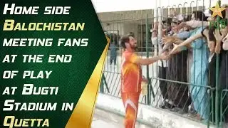 Home side, Balochistan, meeting fans at the end of play at Bugti Stadium in Quetta.
