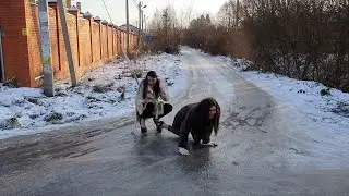 Two sexy models on high heels pumps walking on very slippery ice road, high heels on ice (# 692)