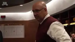 Bob Motzko Receives Game Puck After First Gophers Victory