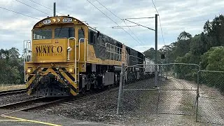 Watco Australia WRC2202 and WRB2180 lead 67S3 Pass Holmview Rd towards Holmview 19/8/25