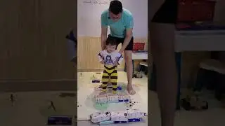 Teach toddler how to jump and land on both feet