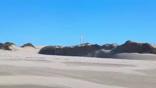 Driving on sand dunes, Worimi National Park, NSW, Australia