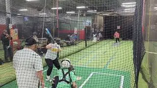 Saturday hitting/pitching league w/ Slammy. Ireland singles up the middle.