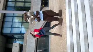 Tim the Beaver dancing with an undergrad