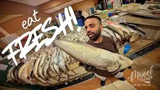 Buy, Fry & Feast! The Ultimate Seafood Experience at Al Kout Marina 🍽️⚓