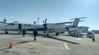 大阪空港32Rテイクオフ右舷窓風景