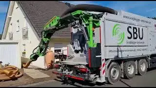 Grasnarbe und Erdaushub saugen
