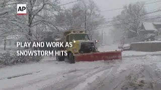 Play and work as snowstorm hits New England