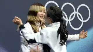 USA's Gold medalist Alysa Liu hugs Nakai Ami Japan's Bronze winner at Winter Olympics 2026