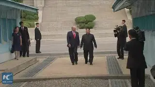 Trump, Kim meet in Panmunjom, pledge to restart talks