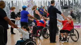 Wheelchair dance program aims to create inclusive community between walkers, rollers