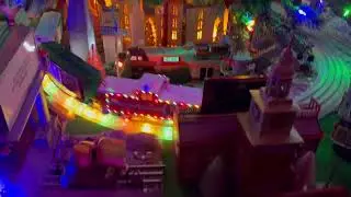 The Lionel Polar Express Lighted Tracks featuring Trippy Trolley & MTH Christmas Extended Caboose