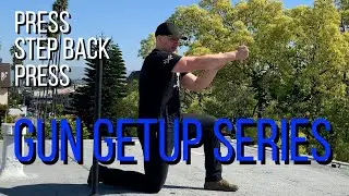 gun getup   gun press standing to step back
