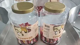 High-Speed Candy Production: Automatic Plastic Can Sealing, Capping & Labeling Line Demo
