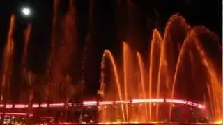 Epcot's Fountain of Nations in Slow Motion, with a Full Moon in the Sky
