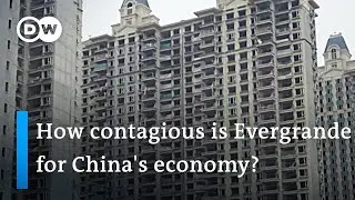 Housing crisis in China: Evergrande shares tank after re-entering trade | DW News