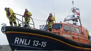 A rough high tide at the South Bay and Lifeboat Scarborough