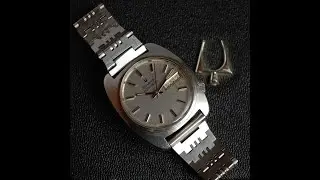 1974 Bulova Accutron men's vintage electronic watch with lined dial.