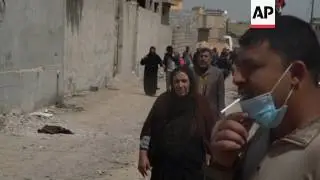 People flee fighting in western Mosul