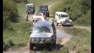 Landrovers playing in a Muddy Pubble by Nine Mile River Salisbury Plain