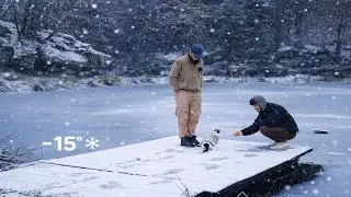 Camping in the middle of a snowstorm on a completely frozen lake