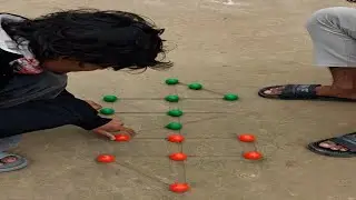 দেখেন বন্ধুরা দুই কালারের বল দিয়া মাটির মধ্যে খেলা || Matir Game || Look friends playing in the mud