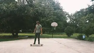 Longboard freestyle tricks on a pintail